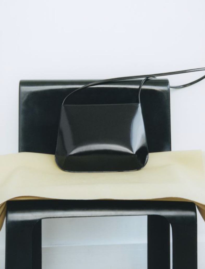 Black purse on a chair